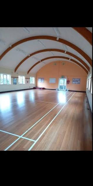 Large wooden floor main hall inside the facility